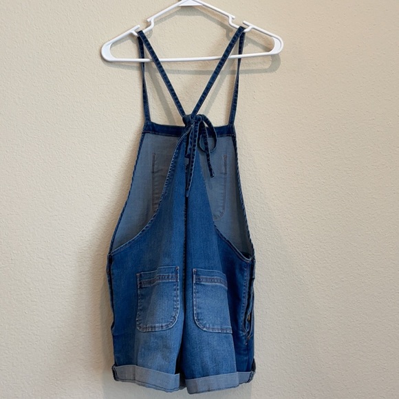 Stretchy Short blue Jean overalls with brass buttons criss cross spaghetti strap - Picture 2 of 6
